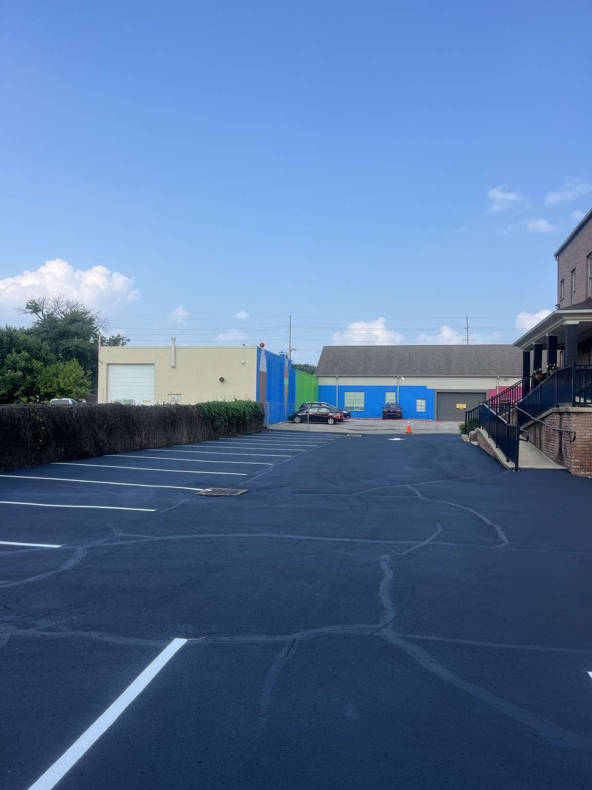 Freshly sealcoated parking area with line striping